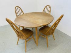 AN ERCOL STYLE BLONDE FINISH CIRCULAR DROP FLAP DINING TABLE & FOUR HOOP BACK DINING CHAIRS (2 A/F