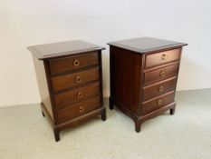 A PAIR OF STAG MINSTREL THREE DRAWER BEDSIDE CHESTS EACH W 53CM. D 46CM. H 72CM.