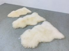 3 LAMB SKIN RUGS 2 MARKED GENUINE LAMB SKIN MADE IN THE UK L 110CM,