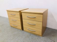 A PAIR OF MODERN BEECHWOOD FINISH THREE DRAWER BEDSIDE CHESTS - W 49CM. D 43CM. H 55CM.