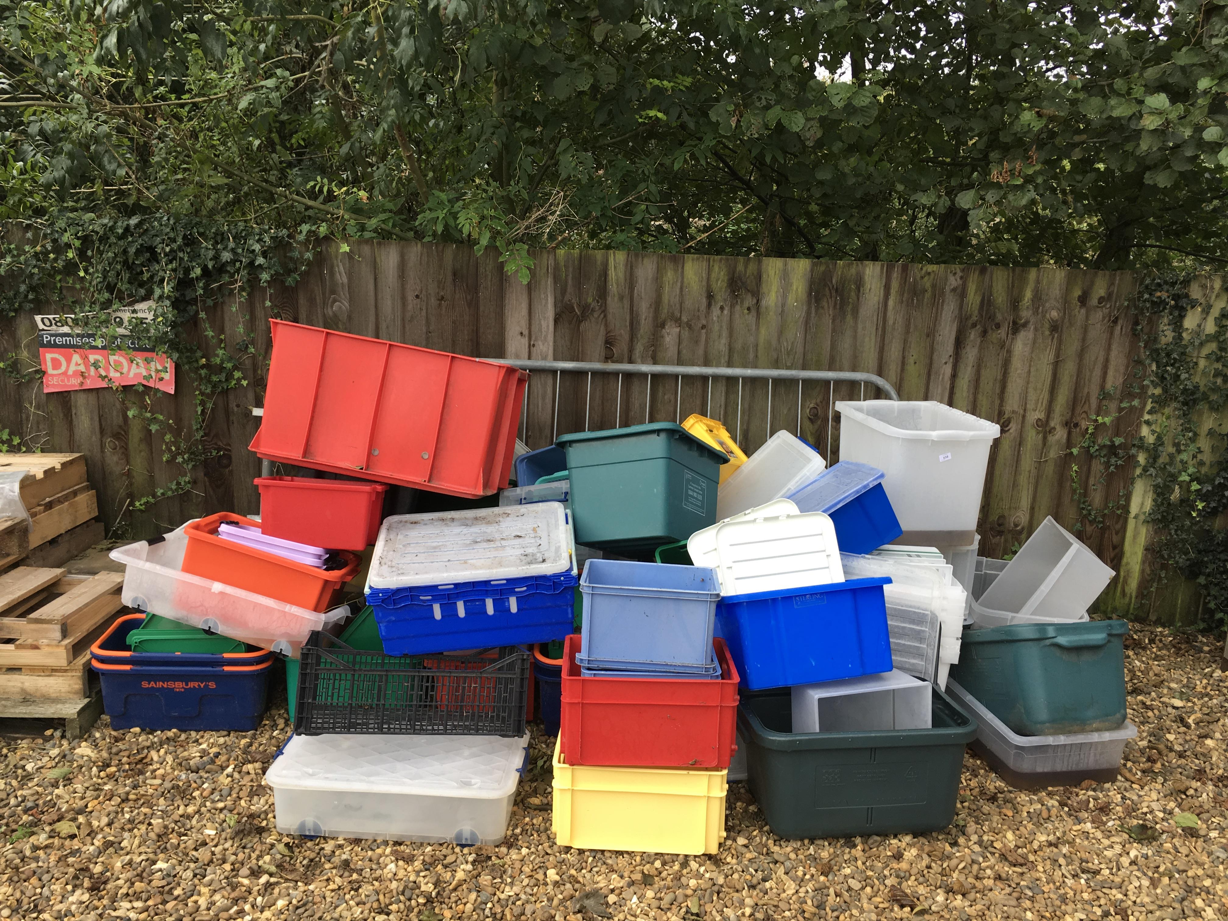 A LARGE QUANTITY OF ASSORTED PLASTIC STORAGE BOXES