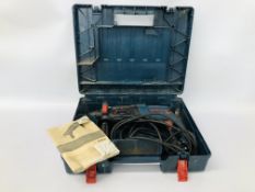 A BOSCH PROFESSIONAL GBH 2-26 DRE SDS POWER DRILL WITH INSTRUCTIONS AND CARRY CASE - SOLD AS SEEN