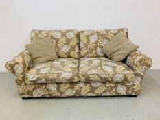 A MODERN SCS LARGE TWO SEATER SOFA WITH LEAF PRINT UPHOLSTERY