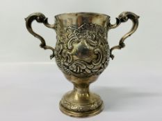 A SILVER 2 HANDLE TROPHY CUP EMBOSSED WITH FLOWERS,