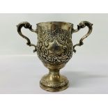 A SILVER 2 HANDLE TROPHY CUP EMBOSSED WITH FLOWERS,