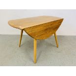 AN ERCOL BLONDE DROP FLAP DINING TABLE - LENGTH 113CM. WIDTH 63CM. (EXTENDED 127CM.