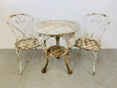 AN OLD DECORATIVE CAST BASE PUB TABLE WITH MARBLE TOP ALONG WITH 2 WROUGHT METAL GARDEN CHAIRS -