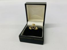 LADIES 9CT CLADDAGH RING SET WITH CENTRAL GARNET