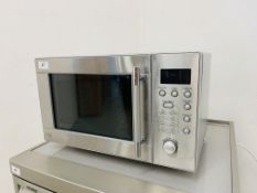 A SAINSBURY'S HOME STAINLESS STEEL MICROWAVE OVEN - SOLD AS SEEN