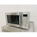 A SAINSBURY'S HOME STAINLESS STEEL MICROWAVE OVEN - SOLD AS SEEN