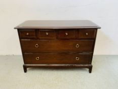 A STAG MINSTREL MULTI DRAWER CHEST, THE FOUR SHORT DRAWERS OVER TWO LONG - W 107CM. D 46CM. H 72CM.