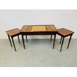 A NEST OF 3 OCCASIONAL TABLES WITH TOOLED LEATHER INSERTS,