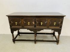 A SOLID OAK TWO DRAWER SIDEBOARD,