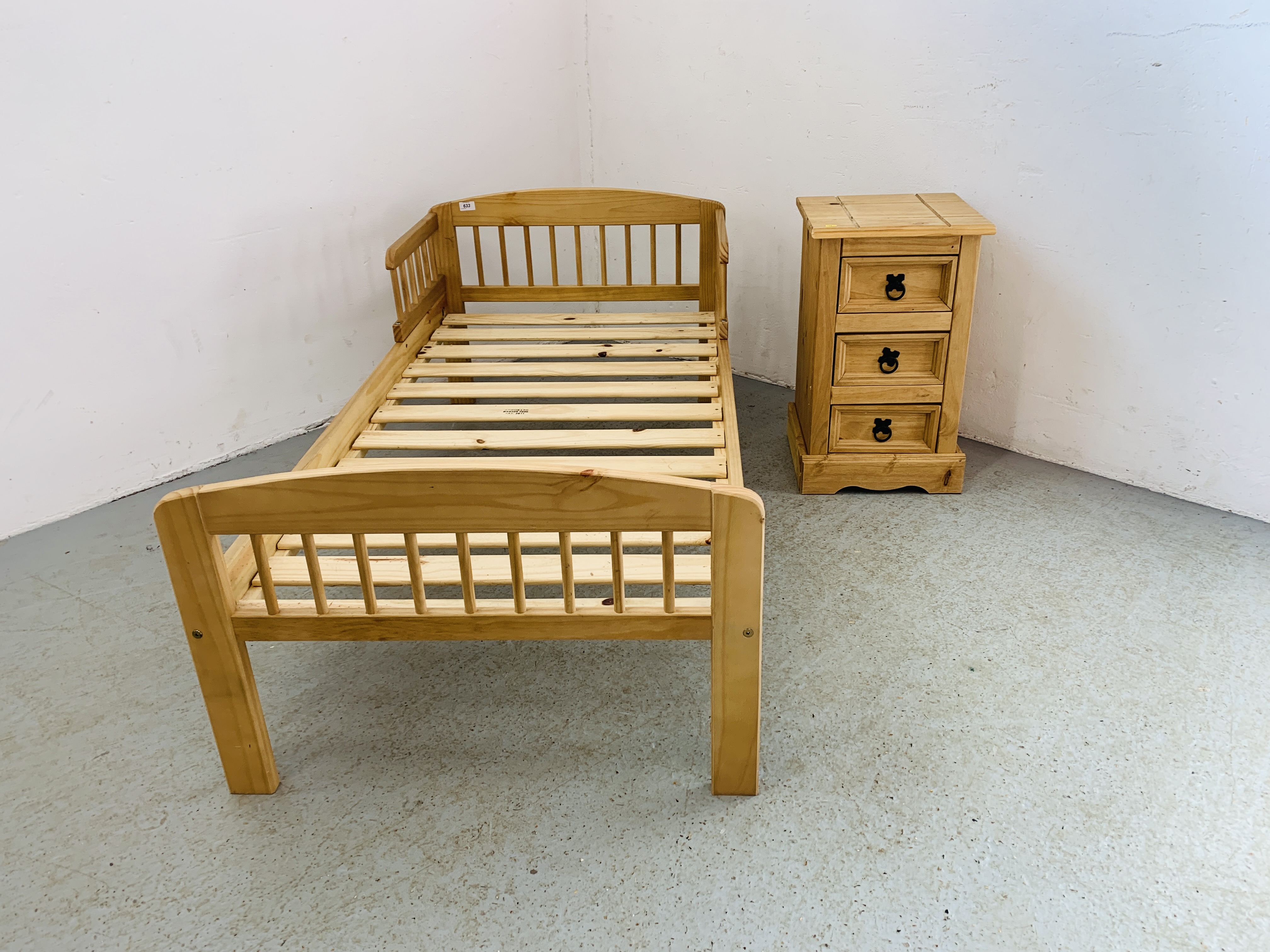 A CHILD'S SOLID PINE "FIRST BED" AND MEXICAN PINE THREE DRAWER BEDSIDE CHEST