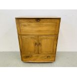 AN ERCOL WINDSOR ELM DRINKS CABINET - W 83CM. D 49CM. H 110CM.