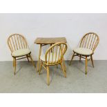 AN ERCOL BLONDE TABLE EXTENSION / DESK WITH THREE ERCOL STICK BACK CHAIRS