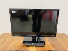 PANASONIC 24" FLAT SCREEN TV WITH REMOTE - SOLD AS SEEN