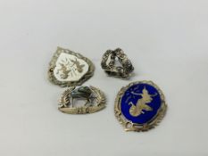 THREE VARIOUS ENAMELLED BROOCHES, TWO WITH EASTERN DESIGNS,