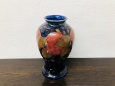 A MOORCROFT BALUSTER VASE POMEGRANATE DESIGN HEIGHT 16CM