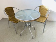 A METAL FRAMED GARDEN BISTRO SET COMPRISING OF A SMALL CIRCULAR GLASS TOP TABLE AND 2 CHAIRS