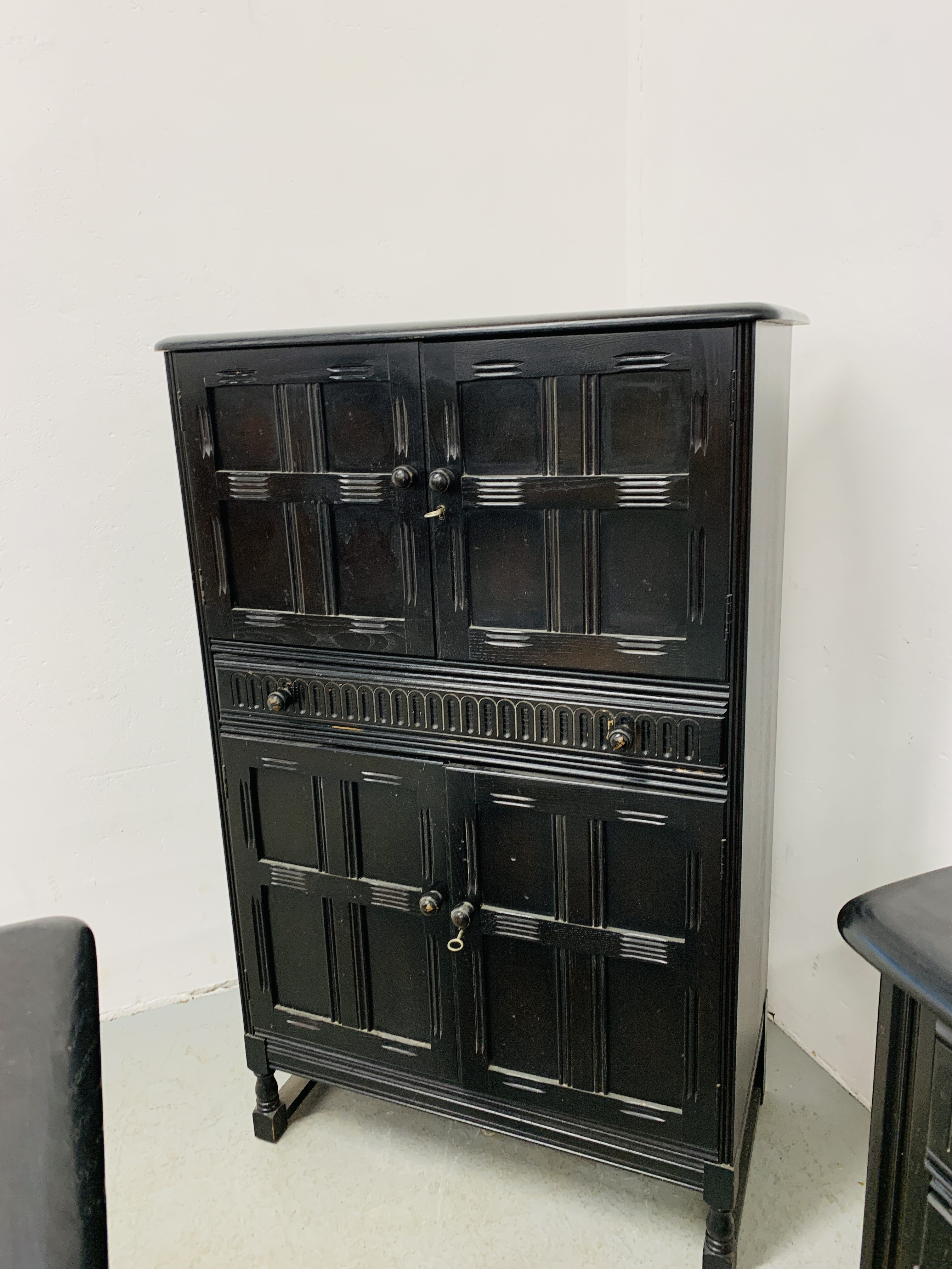 A DARK OAK FOUR DRAWER DRINKS CABINET WITH SINGLE DRAWER - W 82CM. D 43CM. H 128CM. - Image 8 of 11