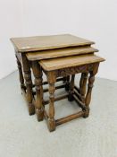 A GOOD QUALITY NEST OF 3 REPRO OAK GRADUATED OCCASIONAL TABLES