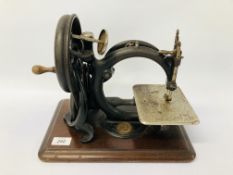 VINTAGE WILLCOX & GIBBS SEWING MACHINE ON MAHOGANY BASE -SOLD AS SEEN