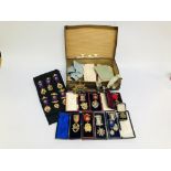 A VINTAGE CASE CONTAINING A COLLECTION OF MASONIC REGALIA TO INCLUDE SASHES, MEDALS, PAPERWORK,