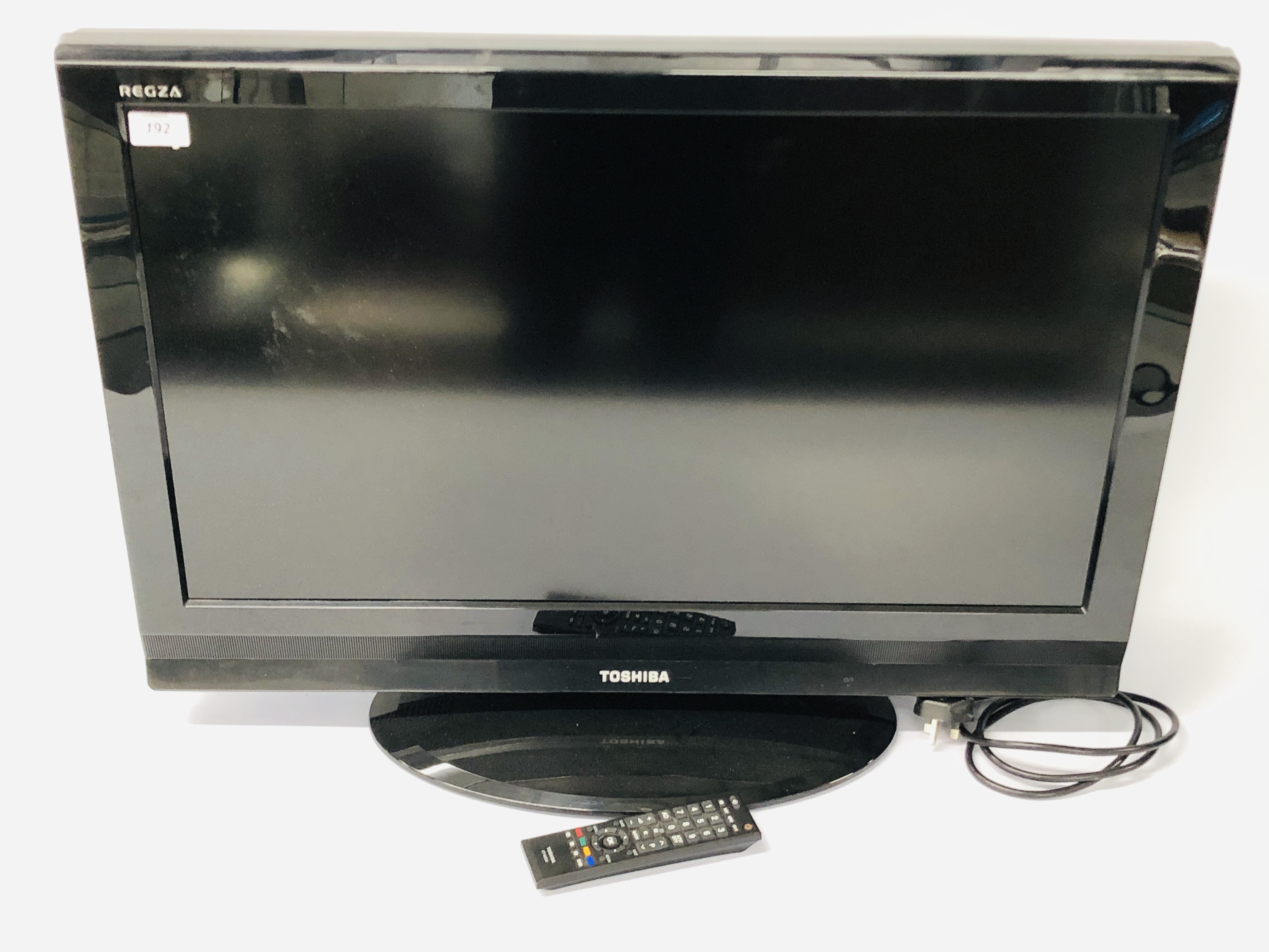 A TOSHIBA REGZA 32 INCH COLOUR LCD TV WITH REMOTE - SOLD AS SEEN