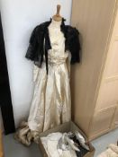 VINTAGE HANDMADE WEDDING GOWN ON DRESS MAKERS DUMMY ALONG WITH A VINTAGE HANDMADE BLACK LACE SHAWL