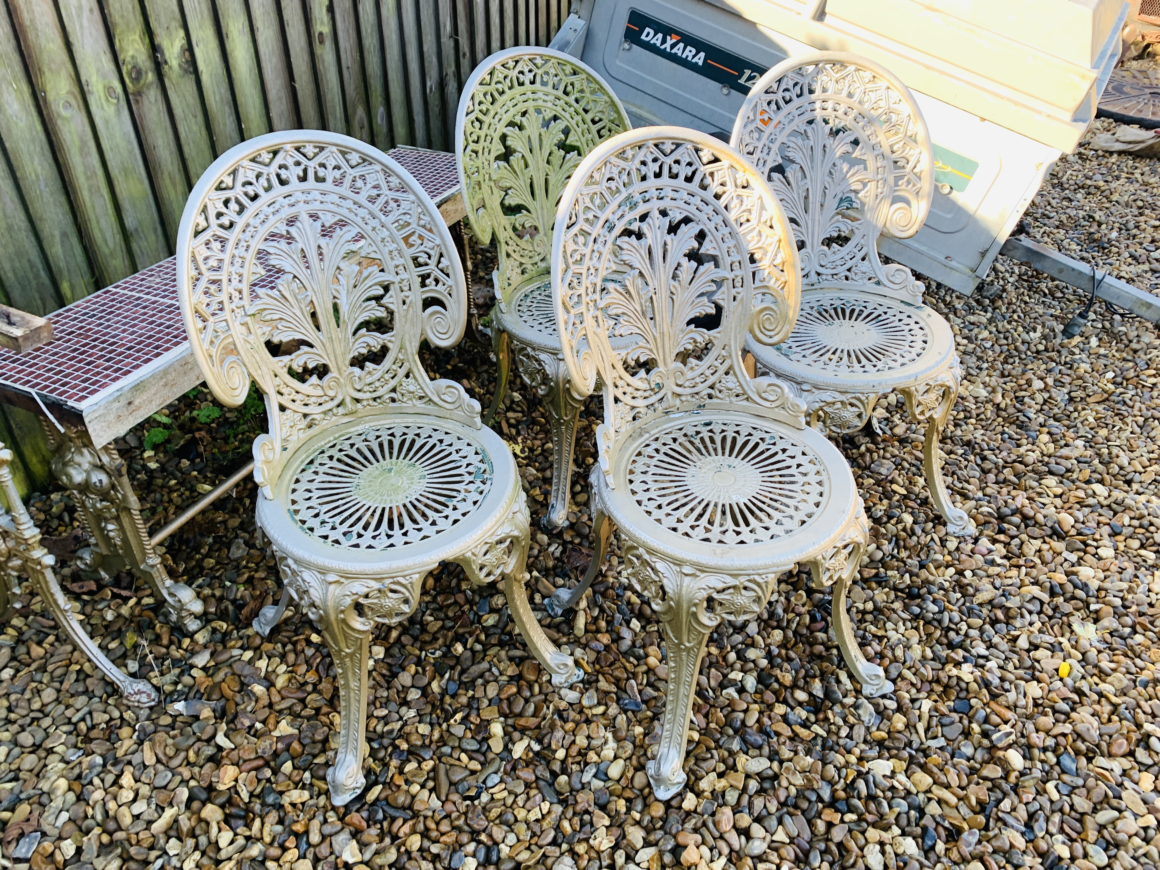SET OF FOUR DECORATIVE CAST ALUMINIUM GARDEN CHAIRS ALONG WITH DECORATIVE CAST IRON TABLE BASE A/F - Image 9 of 12