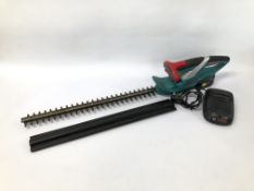 A BOSCH AHS SZL1 18V BATTERY OPERATED HEDGE CUTTER ALONG WITH 1 BATTERY AND CHARGER - SOLD AS SEEN