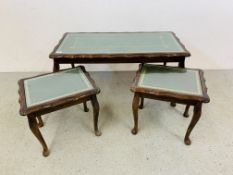 A REPRODUCTION MAHOGANY SET OF THREE OCCASIONAL TABLES,