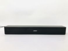 A BOSE SOLO 5 TV SOUND SYSTEM COMPLETE WITH REMOTE - SOLD AS SEEN