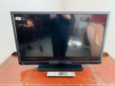 TOSHIBA 32 INCH TELEVISION WITH INTEGRATED DVD PLAYER COMPLETE WITH REMOTE - SOLD AS SEEN