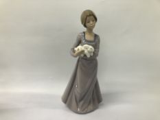 A NAO BY LLADRO PORCELAIN FIGURE OF A GIRL HOLDING WHITE RABBIT H 25CM