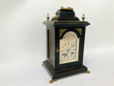 VINTAGE MANTEL CLOCK WITH FOUR BRASS FINIALS AND CLAW FEET.