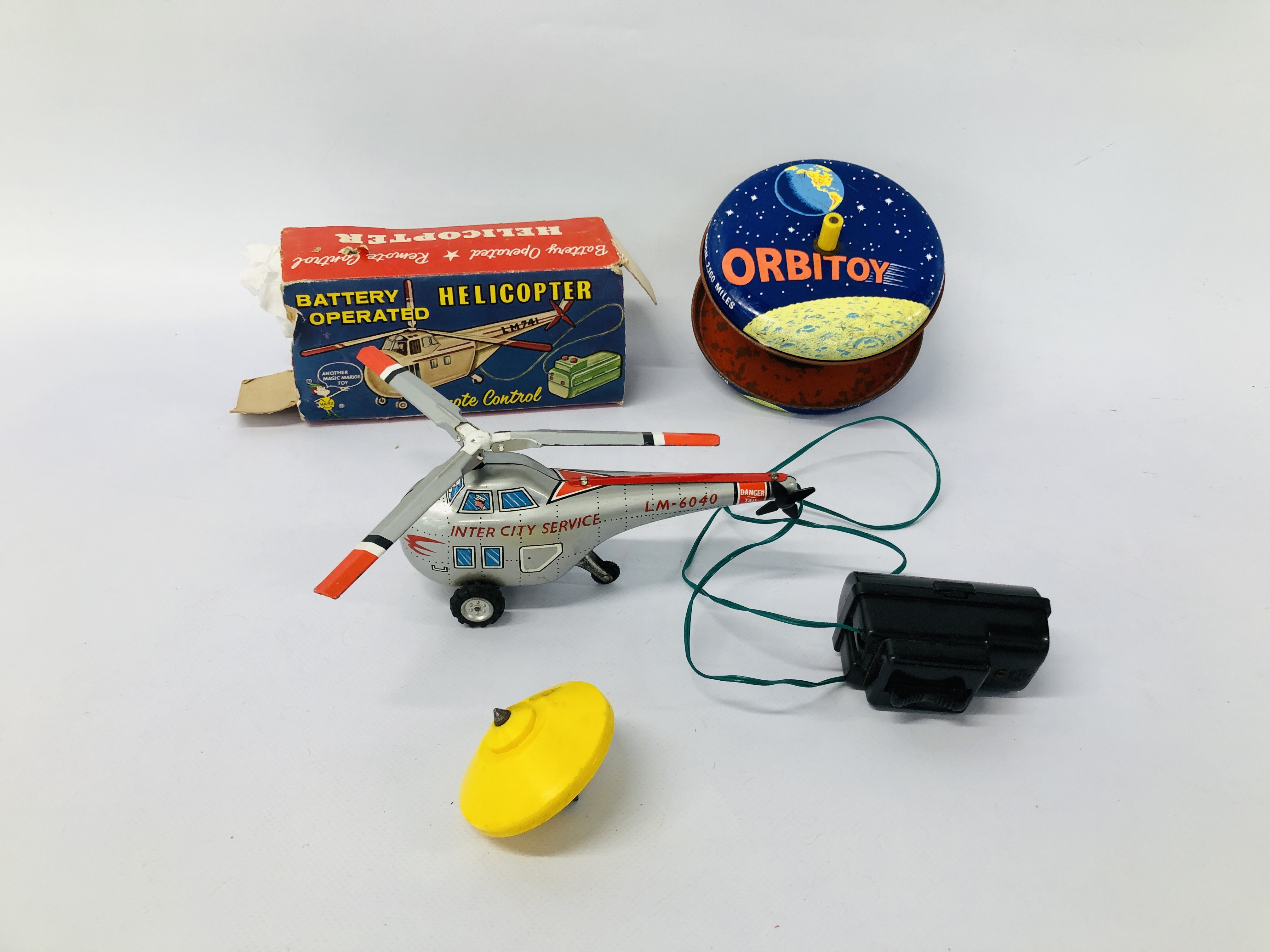 A VINTAGE GREEN MONK COMBEX ORBITOY PAT NO 11468/69 + BATTERY OPERATED HELICOPTER REMOTE CONTROL