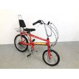 A RALEIGH CHOPPER MRK3 IN RED WITH CHROME HANDLE BARS AND MUD GUARDS