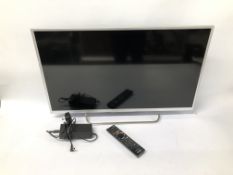 A SONY 32 INCH FLAT SCREEN SMART TV COMPLETE WITH REMOTE - SOLD AS SEEN