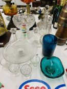 COLLECTION OF GLASSWARE TO INCLUDE VINTAGE DECANTERS, CAKE STAND, BLUE GLASS VASE,