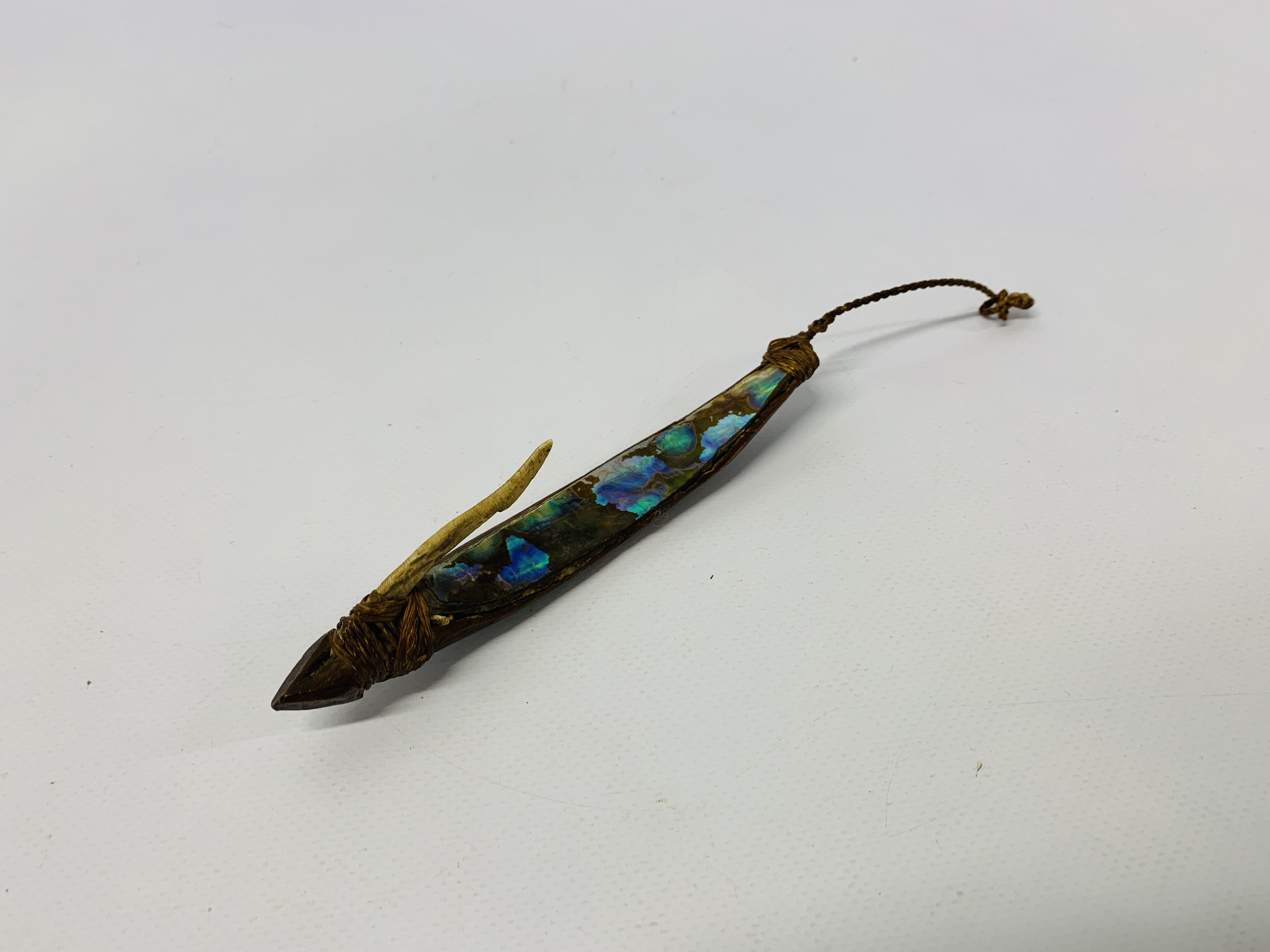 A 19TH CENTRY MAORI FISH HOOK MADE WITH HALIOTIS SHELL,