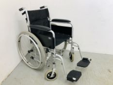 AN ENIGMA MANUAL WHEELCHAIR SILVER FRAME FINISH COMPLETE WITH FOOT RESTS