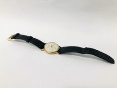 A LONGINES GENTLEMAN'S WRIST WATCH ON LEATHER STRAP (MANUAL MOVEMENT)