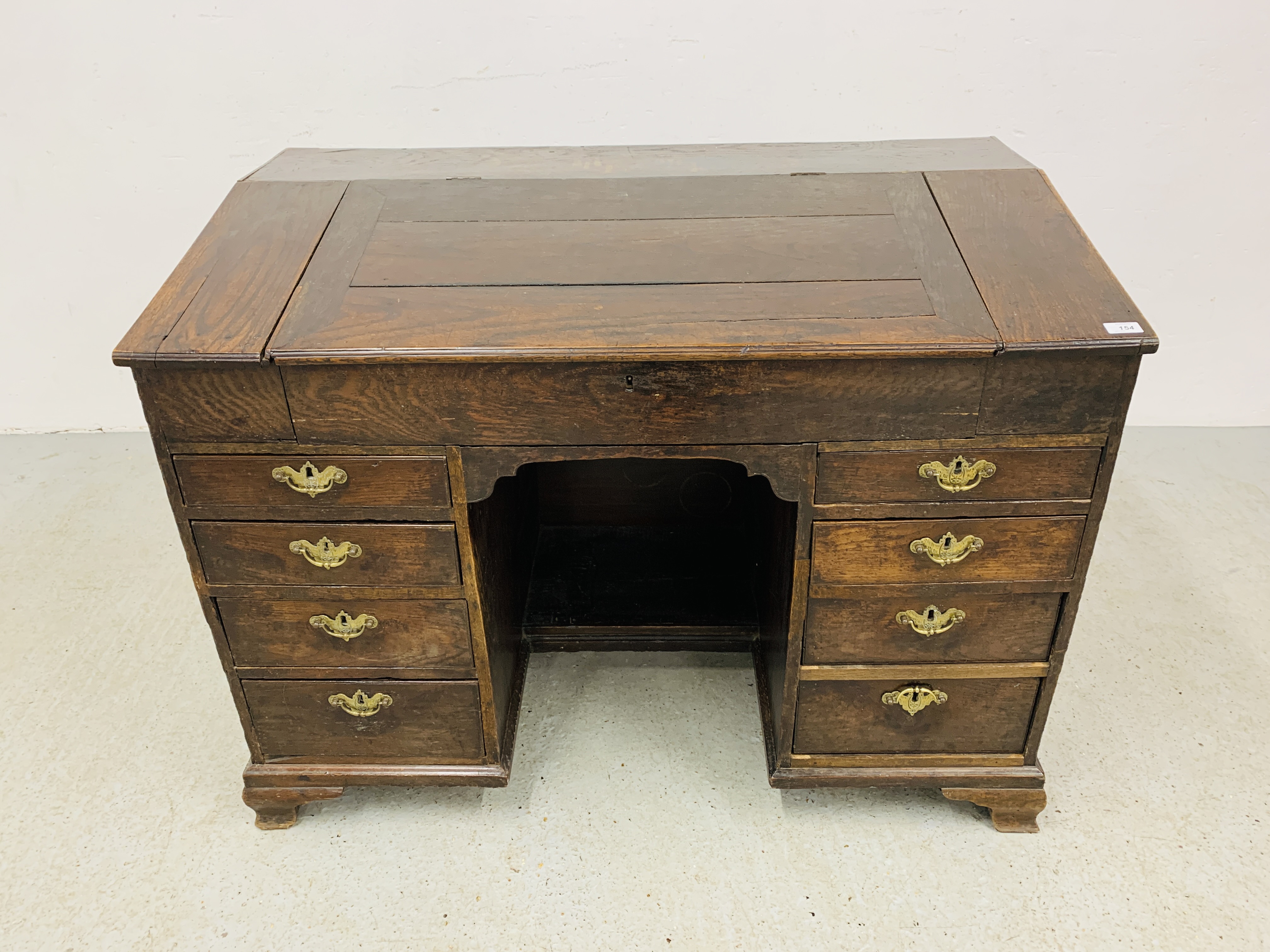 AN C18TH OAK SLOPED TOP KNEEHOLE DESK WITH FITTED INTERIOR AND EIGHT DRAWERS - D 120CM. W 68CM. - Image 2 of 15