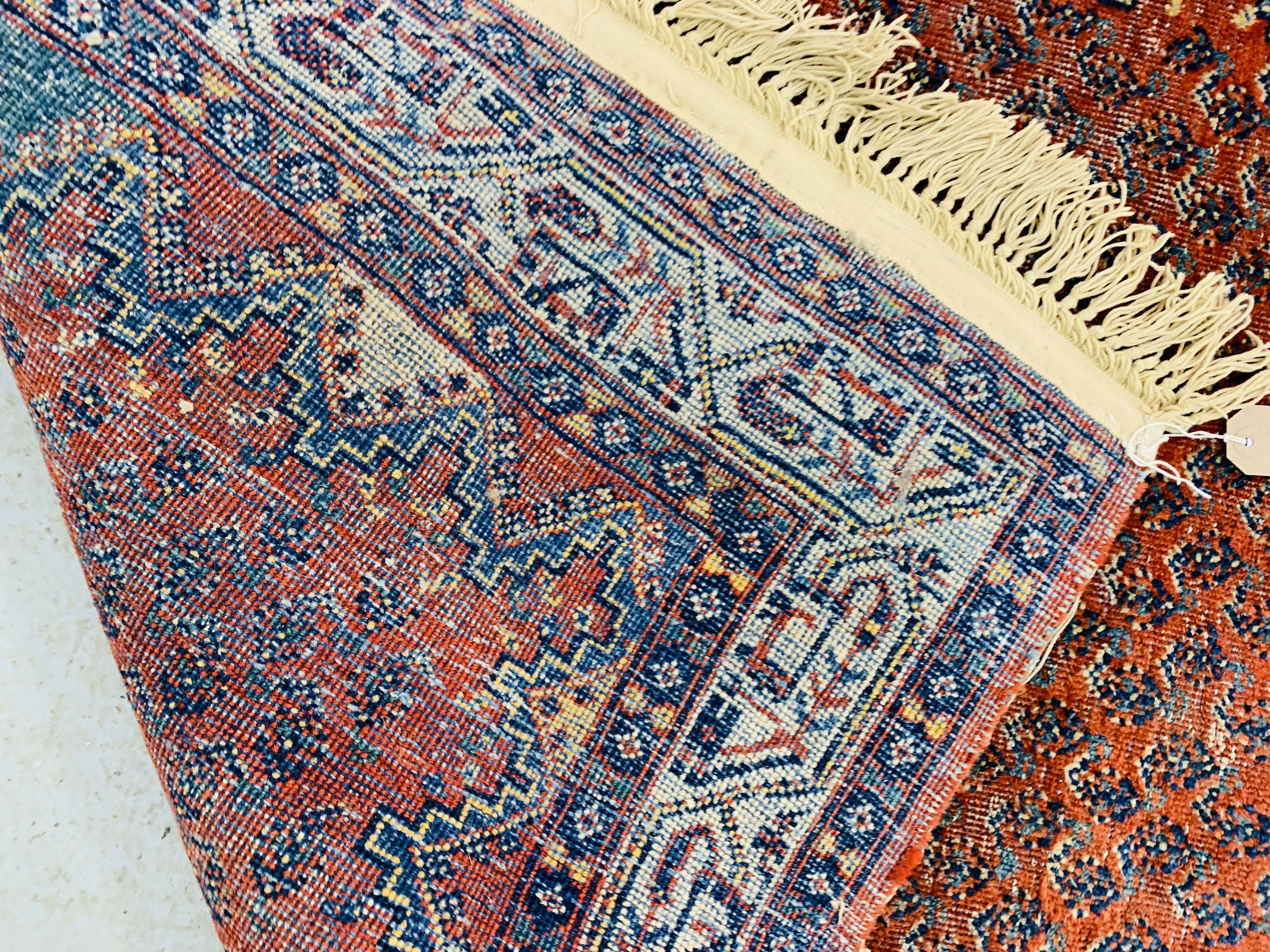 AN EASTERN RED / BLUE PATTERNED RUG - 162 X 103CM. - Image 6 of 6