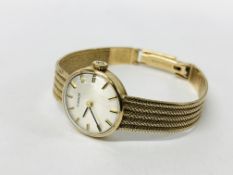 A LADIES 9CT GOLD CASED TISSOT WRIST WATCH ON 9CT GOLD BRAIDED BRACELET STRAP