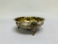 A VICTORIAN CIRCULAR SILVER TRIPOD BOWL, DECORATED WITH ROSES AND LIONS' HEADS.