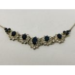 DECORATIVE SILVER EVENING NECKLACE SET WITH CENTRAL BLUE STONE,