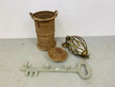 A VINTAGE WICKER LAUNDRY BASKET,